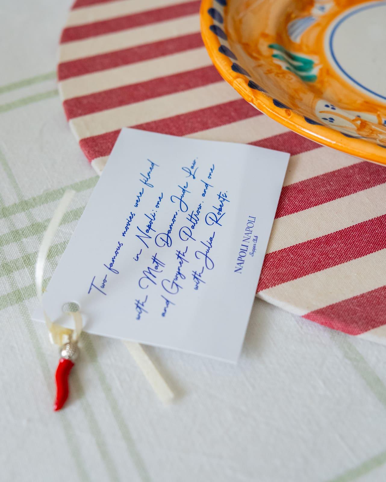 A handwritten place card