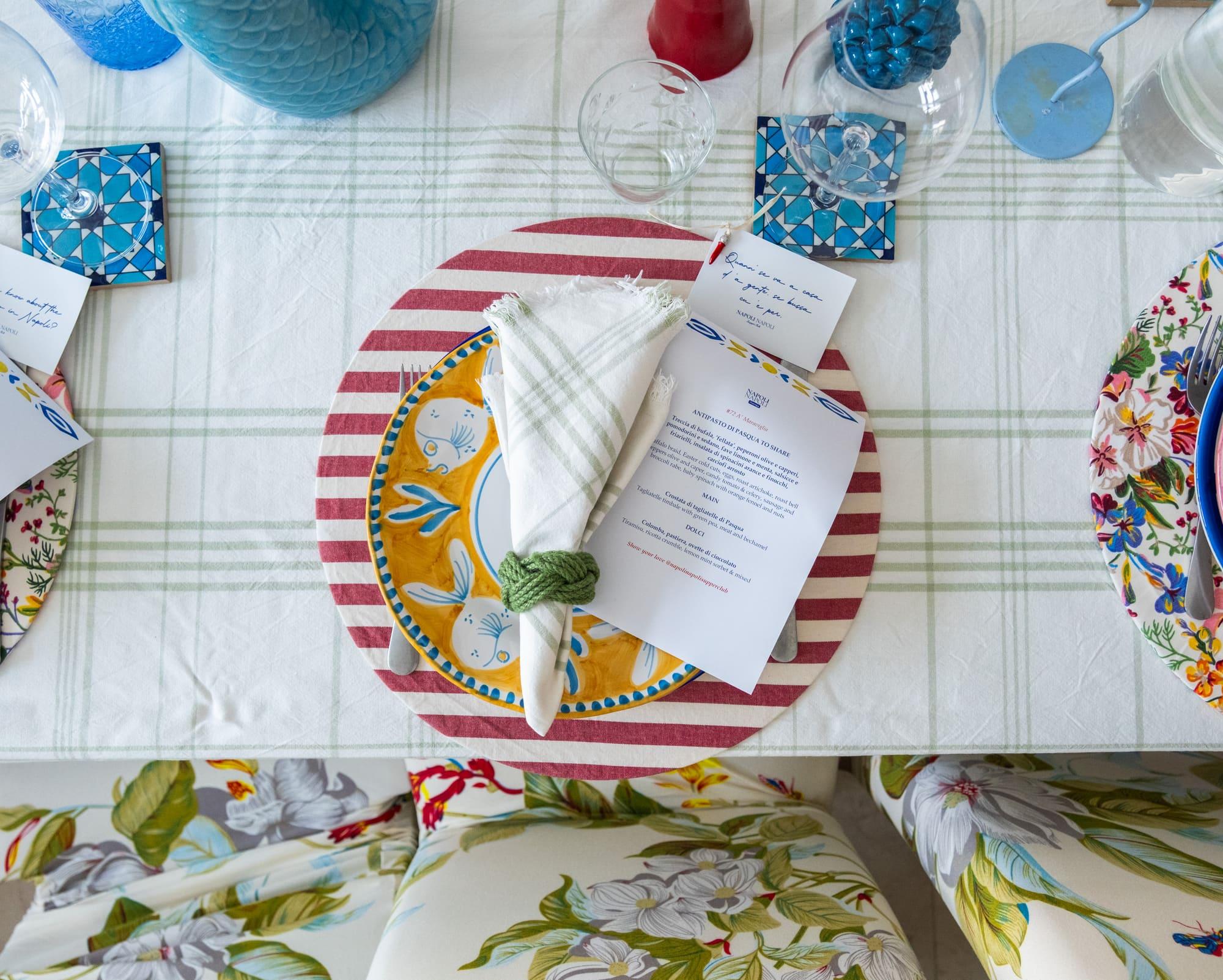 The menu, place card and lucky cornicello